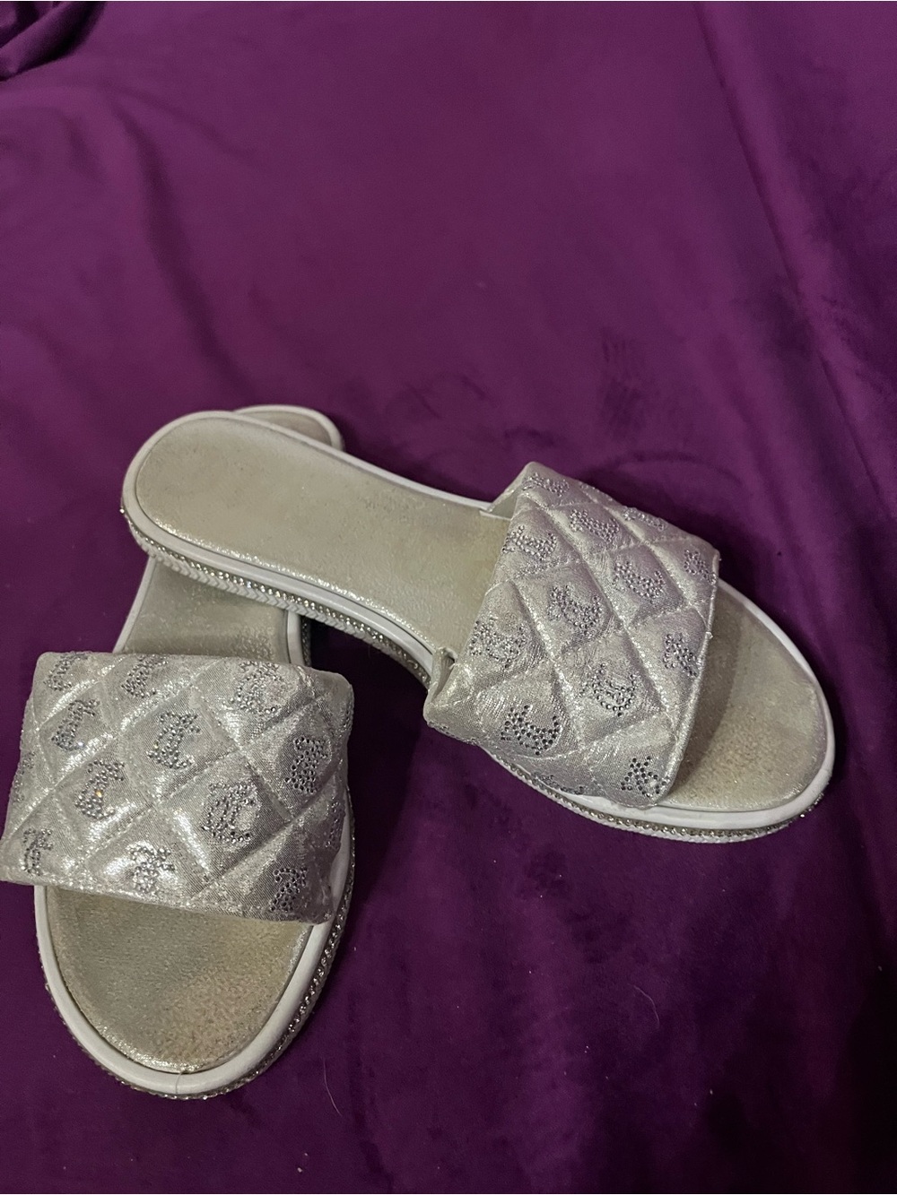 11. Juicy Couture rhinestone-embellished silver sandals
